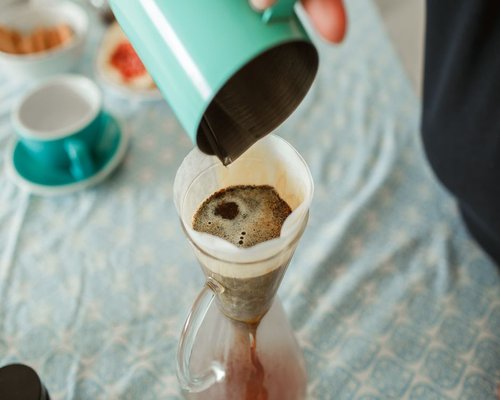 Preparing a slow morning coffee at home